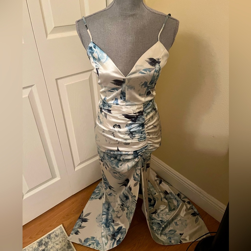 Formal dress. White with blue floral print.